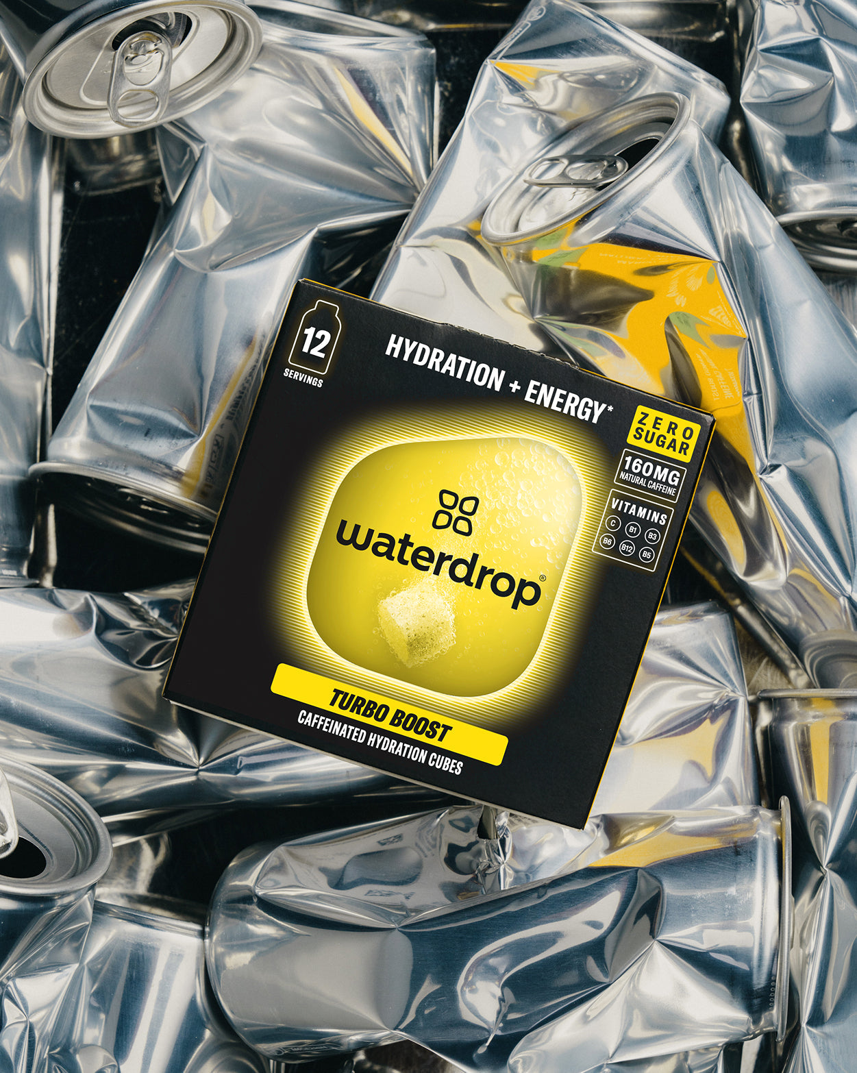 Turbo Boost caffeinated hydration cubes atop crushed cans.